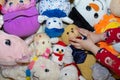 Little girl cosset het favorite teddy toy on the floor while playing in her room Royalty Free Stock Photo