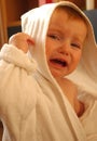 Little girl cry in dressing-gown Royalty Free Stock Photo