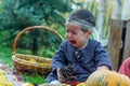 little girl is crying in the autumn park, baby girl in the park Royalty Free Stock Photo