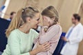 Little girl is crying while with her mother at a doctor on consultation Royalty Free Stock Photo