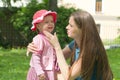 Little girl crying in mothers arm