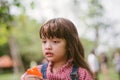 Little girl crying in park.