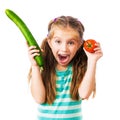 Little girl with cucumber and tomato Royalty Free Stock Photo