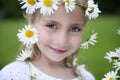 Little girl with daisies in her hair Royalty Free Stock Photo