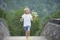 Little girl with daisies in her hair Royalty Free Stock Photo