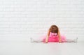 Little girl dancer ballet ballerina stretching