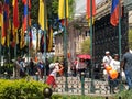 Little Girl Dancing around Flag Poles, Cuenca Ecuador