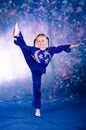 Little girl dancing in the blue costume Royalty Free Stock Photo