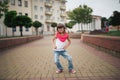 Little girl dancing on the street Royalty Free Stock Photo