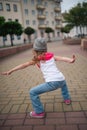 Little girl dancing on the street Royalty Free Stock Photo
