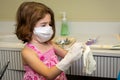 Young Dentist Preparing to Work