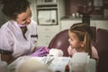 Little girl in dentist office. Royalty Free Stock Photo