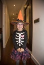 Little girl in disguise for Halloween laughing