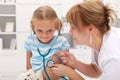 Little girl at the doctor for a checkup