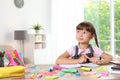 Little girl doing assignment at home Royalty Free Stock Photo