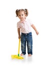 Little girl doing her chore of mopping the floor Royalty Free Stock Photo