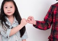 Little girl doing Pinky Swear with her sister