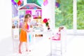 Little girl at doll tea party Royalty Free Stock Photo