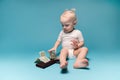 Little girl and dollars on a wallet