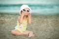 Little girl with Down syndrome wore glasses and poses faces Royalty Free Stock Photo