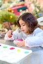 Little Girl Drawing On Stone Outdoors In Summer Sunny Day. Royalty Free Stock Photo