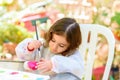 Little Girl Drawing On Stone Outdoors In Summer Sunny Day. Royalty Free Stock Photo