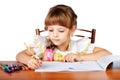 The little girl draws in an album Royalty Free Stock Photo