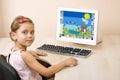 Little girl draws at the computer Royalty Free Stock Photo