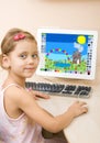 Little girl draws at the computer Royalty Free Stock Photo