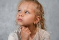 Little girl dreams and looks up, portrait Royalty Free Stock Photo