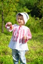 Little girl dresed in Romanian traditional blouse named ie Royalty Free Stock Photo