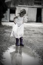 Little Girl in Dress and Wellies