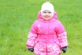 Little girl dressed in a warm pink jacket Royalty Free Stock Photo