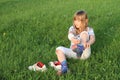 Little girl dressing up socks Royalty Free Stock Photo