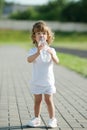 Little girl drinking clean water from plastic Royalty Free Stock Photo