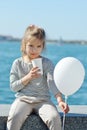 Little girl drinking cocoa