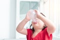Little girl drinking a glasss of milk Royalty Free Stock Photo
