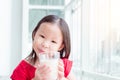 Little girl drinking a glasss of milk Royalty Free Stock Photo