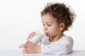 Little girl drinking milk