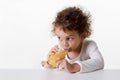 Little girl drinking orange juice Royalty Free Stock Photo