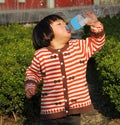 Little girl drinking water Royalty Free Stock Photo