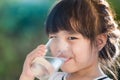 Little girl drinking water. Royalty Free Stock Photo