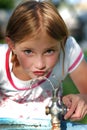 Little Girl Drinking from Water Fountain Royalty Free Stock Photo