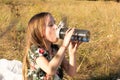 Little girl drinking water from a glass bottle in nature Royalty Free Stock Photo