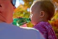 little girl is drinking water outside health concept and life of person