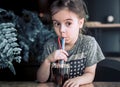 A child drinks a drink from a straw Royalty Free Stock Photo