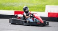 Little Girl Drives Fast Go-Kart By Racing Track