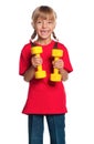 Little girl with dumbbells Royalty Free Stock Photo