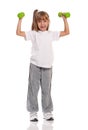 Little girl with dumbbells Royalty Free Stock Photo