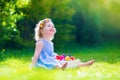 Little girl on Easter egg hunt Royalty Free Stock Photo